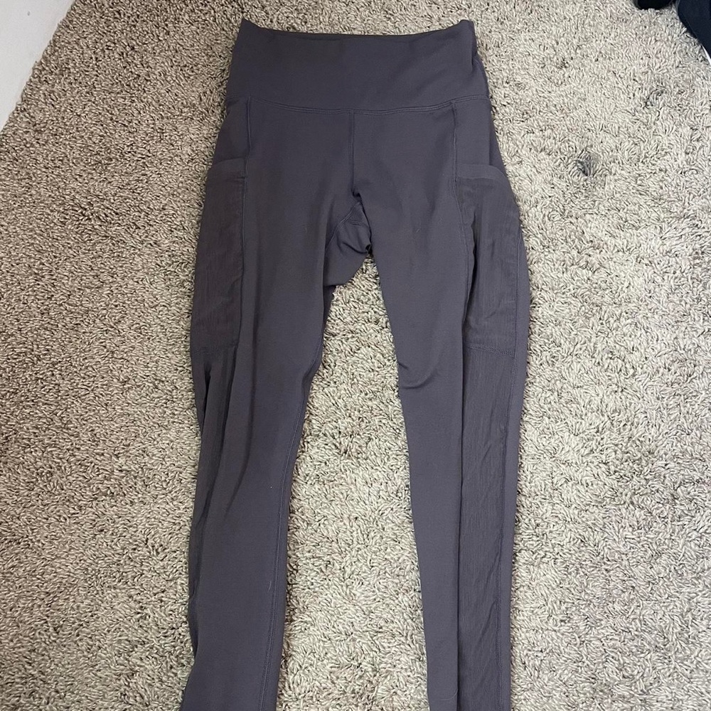 Fabletics purple/grey leggings 
Net pockets on both sides